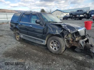 2001 Lincoln Navigator z VIN 5LMFU28R01LJ32925, wystawiony jako Copart lot #83013504 z przebiegiem 132 750 mil mil oraz Szkody całkowita. Historia ofert i sprzedaży dostępna na DreamBid. Obrazek 4.