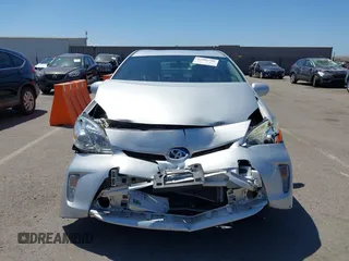 2015 Toyota Prius Four with VIN JTDKN3DU0F0443458, listed as a IAAI auction lot 42086506 with 121,952 mi miles and . Bid and sale history available at DreamBid. Image 13.