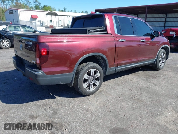 2019 Honda Ridgeline RTL-E with VIN 5FPYK3F72KB024461, listed as a IAAI auction lot 41813568 with 122,364 mi miles and . Bid and sale history available at DreamBid. Image 4.