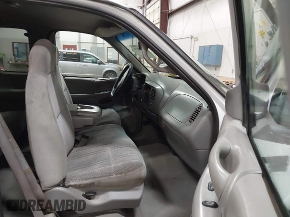 1998 Ford F-150 с VIN 1FTRX18L1WKB99239, выставлен на аукционе IAAI как лот 41987823 с пробегом 217 930 миль миль и . История ставок и продаж доступна на DreamBid. Изображение 5.