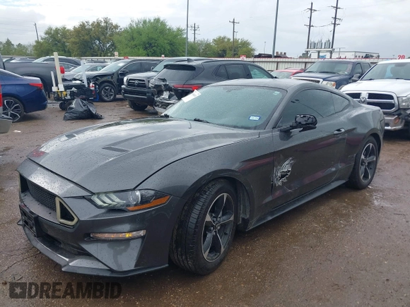 2018 Ford Mustang EcoBoost z VIN 1FA6P8TH2J5184485, wystawiony jako IAAI lot #41884810 z przebiegiem 74 999 mil mil oraz . Historia ofert i sprzedaży dostępna na DreamBid. Obrazek 2.
