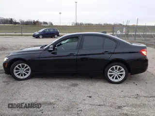 2018 BMW 3 Series 320i with VIN WBA8E1G56JNU91008, listed as a IAAI auction lot 41247490 with 57,434 mi miles. Bid and sale history available at carsss.com. Image 14.
