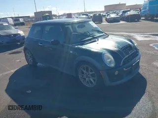 2006 MINI Hardtop S with VIN WMWRE33566TJ34081, listed as a IAAI auction lot 41265659 with 71,441 mi miles and . Bid and sale history available at DreamBid. Image 1.