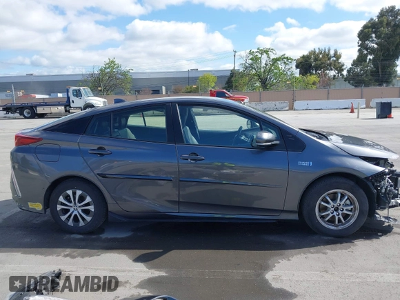 2022 Toyota Prius LE with VIN JTDKAMFP7N3206830, listed as a IAAI auction lot 41984239 with 57,681 mi miles and . Bid and sale history available at DreamBid. Image 13.