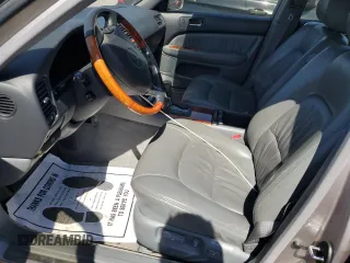 1998 Lexus LS 400 z VIN JT8BH28F5W0134712, wystawiony jako Copart lot #55626005 z przebiegiem 152 358 mil mil oraz Szkoda całkowita • Salvage title. Historia ofert i sprzedaży dostępna na DreamBid. Obrazek 7.