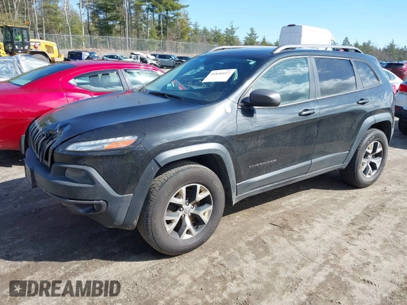 2014 Jeep Cherokee Trailhawk with VIN 1C4PJMBS3EW127749, listed as a IAAI auction lot 41836617 with 207,002 mi miles and . Bid and sale history available at DreamBid. Image 21.