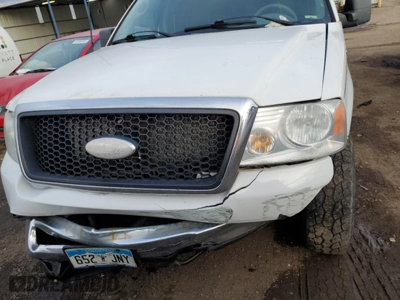 2007 Ford F-150 XLT with VIN 1FTRW14W47KC40614, listed as a Copart auction lot 42415565 with 295,398 mi miles and Salvage title. Bid and sale history available at DreamBid. Image 11.