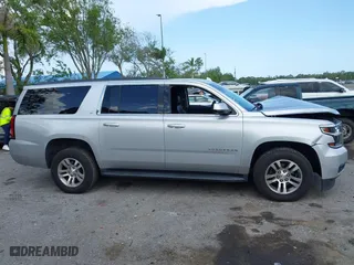 2018 Chevrolet Suburban LT with VIN 1GNSCHKC7JR162024, listed as a IAAI auction lot 41924750 with 112,640 mi miles. Bid and sale history available at carsss.com. Image 14.