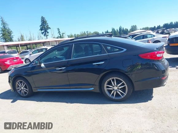 2015 Hyundai Sonata Sport z VIN 5NPE34AB5FH198560, wystawiony jako IAAI lot #42467031 z przebiegiem 96 111 mil mil oraz . Historia ofert i sprzedaży dostępna na DreamBid. Obrazek 14.