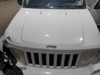2012 Jeep Liberty Sport with VIN 1C4PJLAK5CW127485, listed as a Copart auction lot 48242425 with 139,273 mi miles and Salvage Title. Bid and sale history available at DreamBid. Image 12.