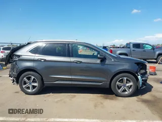 2019 Ford Edge SEL z VIN 2FMPK3J92KBC63577, wystawiony jako IAAI lot #41948953 z przebiegiem 72 551 mil mil oraz . Historia ofert i sprzedaży dostępna na DreamBid. Obrazek 14.