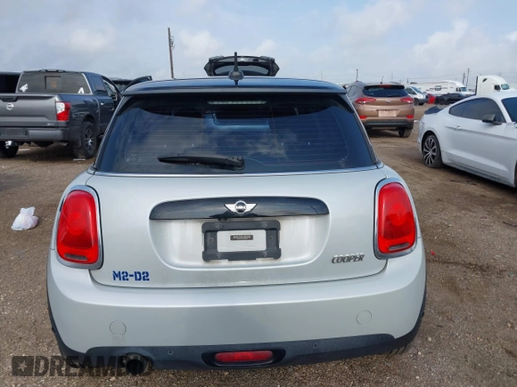 2017 MINI Hardtop Cooper z VIN WMWXP5C35H3C64595, wystawiony jako IAAI lot #42078919 z przebiegiem 93 141 mil mil oraz . Historia ofert i sprzedaży dostępna na DreamBid. Obrazek 16.