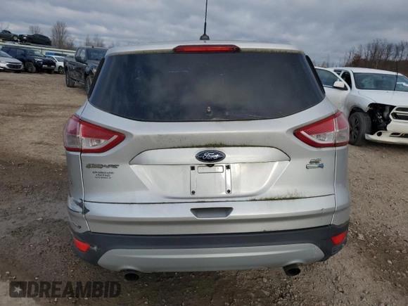 2014 Ford Escape SE with VIN 1FMCU9GX3EUD72937, listed as a Copart auction lot 53879405 with Not Provided miles and Non Repairable. Bid and sale history available at DreamBid. Image 6.