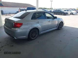 2013 Subaru Impreza Sedan WRX WRX with VIN JF1GV7E60DG014909, listed as a IAAI auction lot 42127645 with 70,360 mi miles. Bid and sale history available at carsss.com. Image 4.