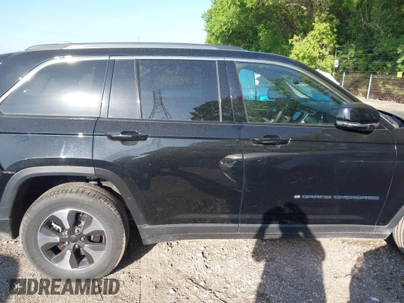 2023 Jeep Grand Cherokee with VIN 1C4RJYB68PC648859, listed as a IAAI auction lot 42267180 with 29,809 mi miles and . Bid and sale history available at DreamBid. Image 13.