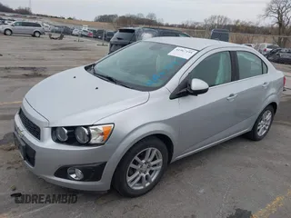 2012 Chevrolet Sonic LT with VIN 1G1JC5SH0C4162034, listed as a IAAI auction lot 41967195 with 87,086 mi miles and . Bid and sale history available at DreamBid. Image 17.