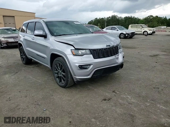 2018 Jeep Grand Cherokee Altitude with VIN 1C4RJEAG9JC246753, listed as a Copart auction lot 54497745 with 121,665 mi miles and Salvage title. Bid and sale history available at DreamBid. Image 14.