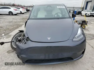 2023 Tesla Model Y Long Range z VIN 7SAYGDEE8PF884567, wystawiony jako Copart lot #45181465 z przebiegiem 16 653 mil mil oraz Szkoda całkowita • Salvage title. Historia ofert i sprzedaży dostępna na DreamBid. Obrazek 5.