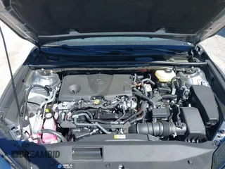 2025 Toyota Camry LE z VIN 4T1DAACK2SU566377, wystawiony jako IAAI lot #41818582 z przebiegiem 1 950 mil mil oraz . Historia ofert i sprzedaży dostępna na DreamBid. Obrazek 10.