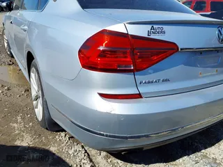2016 Volkswagen Passat 1.8T SEL with VIN 1VWCT7A35GC011006, listed as a IAAI auction lot 41039744 with 123,422 mi miles. Bid and sale history available at carsss.com. Image 18.