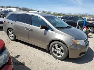 2011 Honda Odyssey Touring Elite with VIN 5FNRL5H9XBB030061, listed as a Copart auction lot 55067775 with 142,245 mi miles and Clean Title. Bid and sale history available at DreamBid. Image 4.