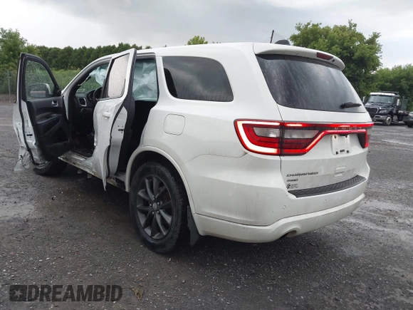 2014 Dodge Durango SXT with VIN 1C4RDJAG0EC561950, listed as a IAAI auction lot 42650331 with 106,959 mi miles and . Bid and sale history available at DreamBid. Image 3.