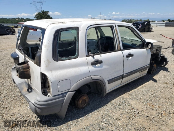 2003 Chevrolet Tracker ZR2 z VIN 2CNBJ734236932592, wystawiony jako Copart lot #58171145 z przebiegiem Nie podano mil oraz Szkoda całkowita • Salvage title. Historia ofert i sprzedaży dostępna na DreamBid. Obrazek 3.