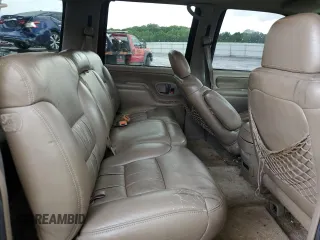 1999 Chevrolet Suburban with VIN 3GNEC16RXXG260623, listed as a Copart auction lot 54609694 with 246,460 mi miles and Salvage Title. Bid and sale history available at carsss.com. Image 11.