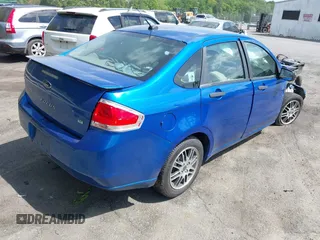 2010 Ford Focus SE z VIN 1FAHP3FNXAW168235, wystawiony jako IAAI lot #42091111 z przebiegiem 64 198 mil mil oraz . Historia ofert i sprzedaży dostępna na DreamBid. Obrazek 4.