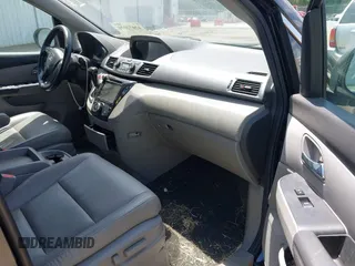 2014 Honda Odyssey EX-L with VIN 5FNRL5H66EB062158, listed as a IAAI auction lot 42072020 with 211,278 mi miles and . Bid and sale history available at carsss.com. Image 5.