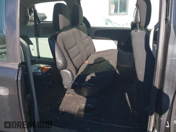 2016 Dodge Grand Caravan SE with VIN 2C4RDGBG8GR276120, listed as a IAAI auction lot 40621416 with 58,884 mi miles and . Bid and sale history available at DreamBid. Image 8.