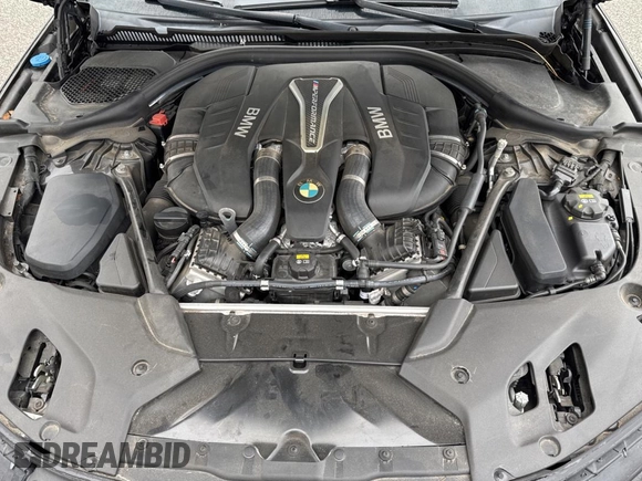 2018 BMW 5 Series M550i xDrive with VIN WBAJB9C57JB035521, listed as a Copart auction lot 54177125 with 63,924 mi miles and Clean Title. Bid and sale history available at carsss.com. Image 7.