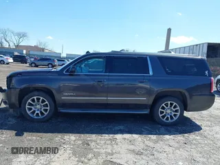 2015 GMC Yukon XL Denali with VIN 1GKS2JKJ5FR144991, listed as a IAAI auction lot 41877853 with 167,814 mi miles. Bid and sale history available at carsss.com. Image 15.