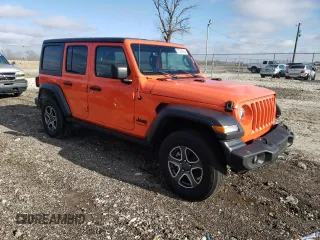 2023 Jeep Wrangler Sport with VIN 1C4HJXDG8PW687459, listed as a Copart auction lot 87302924 with 16,637 mi miles and Salvage Title. Bid and sale history available at DreamBid. Image 4.