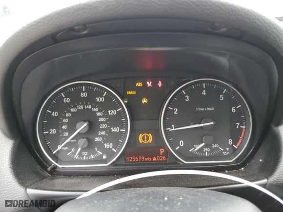 2011 BMW 1 Series 135i with VIN WBAUC9C56BVM09045, listed as a Copart auction lot 73316874 with 125,679 mi miles and Salvage Title. Bid and sale history available at carsss.com. Image 9.