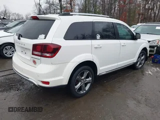 2017 Dodge Journey Crossroad Plus z VIN 3C4PDCGB8HT517069, wystawiony jako IAAI lot #41553745 z przebiegiem 77 926 mil mil oraz . Historia ofert i sprzedaży dostępna na DreamBid. Obrazek 4.