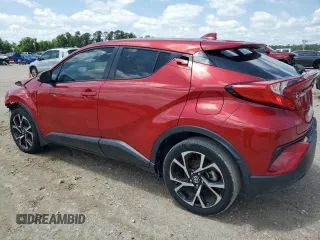 2021 Toyota C-HR LE with VIN JTNKHMBX0M1098199, listed as a Copart auction lot 56197565 with 33,119 mi miles and Salvage Title. Bid and sale history available at DreamBid. Image 2.