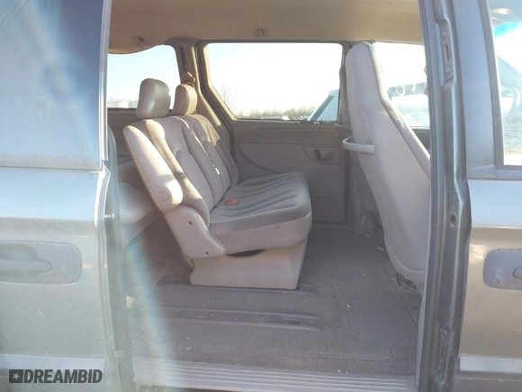 2003 Dodge Caravan SE with VIN 1D4GP24313B150883, listed as a IAAI auction lot 41760786 with 165,718 mi miles. Bid and sale history available at carsss.com. Image 8.