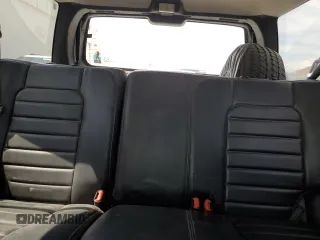 1996 Jeep Grand Cherokee Laredo z VIN 1J4GZ58S8TC222435, wystawiony jako Copart lot #62347665 z przebiegiem 202 125 mil mil oraz Czysty tytuł • Clean title. Historia ofert i sprzedaży dostępna na DreamBid. Obrazek 10.