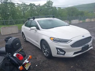 2019 Ford Fusion Titanium with VIN 3FA6P0RU8KR208230, listed as a IAAI auction lot 42261504 with 108,585 mi miles and . Bid and sale history available at DreamBid. Image 1.