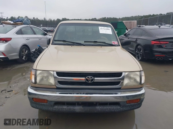 1999 Toyota Tacoma with VIN 4TAVL52N4XZ524059, listed as a IAAI auction lot 41761806 with 214,425 mi miles and . Bid and sale history available at DreamBid. Image 12.