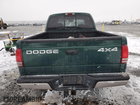 2002 Dodge Dakota SLT с VIN 1B7HG48N12S614309, выставлен на аукционе Copart как лот 87309554 с пробегом 287 994 миль миль и Списание • Salvage title. История ставок и продаж доступна на DreamBid. Изображение 6.