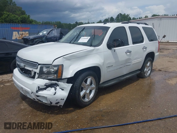 2013 Chevrolet Tahoe LS with VIN 1GNSCAE01DR260799, listed as a IAAI auction lot 42496680 with 199,276 mi miles and . Bid and sale history available at DreamBid. Image 2.