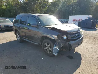 2006 Mazda Tribute S with VIN 4F2YZ06136KM31485, listed as a Copart auction lot 75412344 with Not Provided miles and Salvage Title. Bid and sale history available at DreamBid. Image 4.