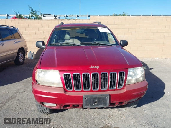 2002 Jeep Grand Cherokee Limited with VIN 1J8GX58N92C186560, listed as a IAAI auction lot 41383003 with 206,195 mi miles and . Bid and sale history available at DreamBid. Image 12.