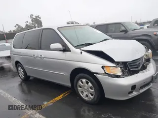2003 Honda Odyssey EX with VIN 5FNRL18603B149365, listed as a IAAI auction lot 41108540 with 226,087 mi miles. Bid and sale history available at carsss.com. Image 13.