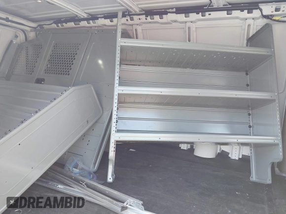 2024 Chevrolet Express Cargo with VIN 1GCWGAFP2R1279801, listed as a IAAI auction lot 42235836 with 11,611 mi miles and . Bid and sale history available at DreamBid. Image 8.