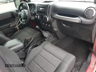 2012 Jeep Wrangler Sport z VIN 1C4AJWAG7CL105511, wystawiony jako Copart lot #62822985 z przebiegiem 137 520 mil mil oraz Czysty tytuł • Clean title. Historia ofert i sprzedaży dostępna na DreamBid. Obrazek 8.