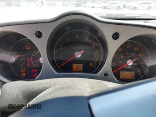 2006 Nissan 350Z Touring with VIN JN1AZ36A96M452478, listed as a IAAI auction lot 41843993 with 211,567 mi miles. Bid and sale history available at carsss.com. Image 7.