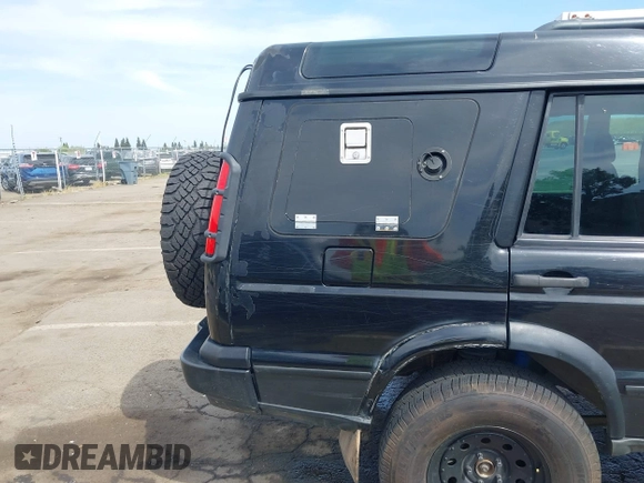 2004 Land Rover Discovery SE with VIN SALTW19464A860565, listed as a IAAI auction lot 42019860 with 153,274 mi miles. Bid and sale history available at carsss.com. Image 21.